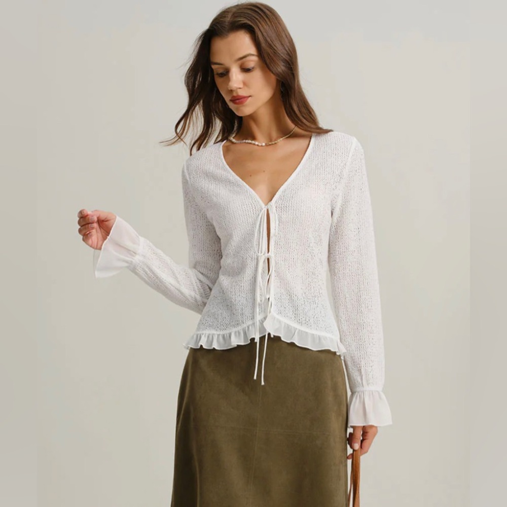 White ruffled sleeve tie front blouse